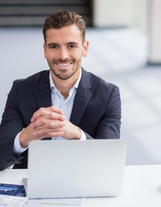 businessman-sitting-with-laptop-2021-08-28-18-33-28-utc.jpg